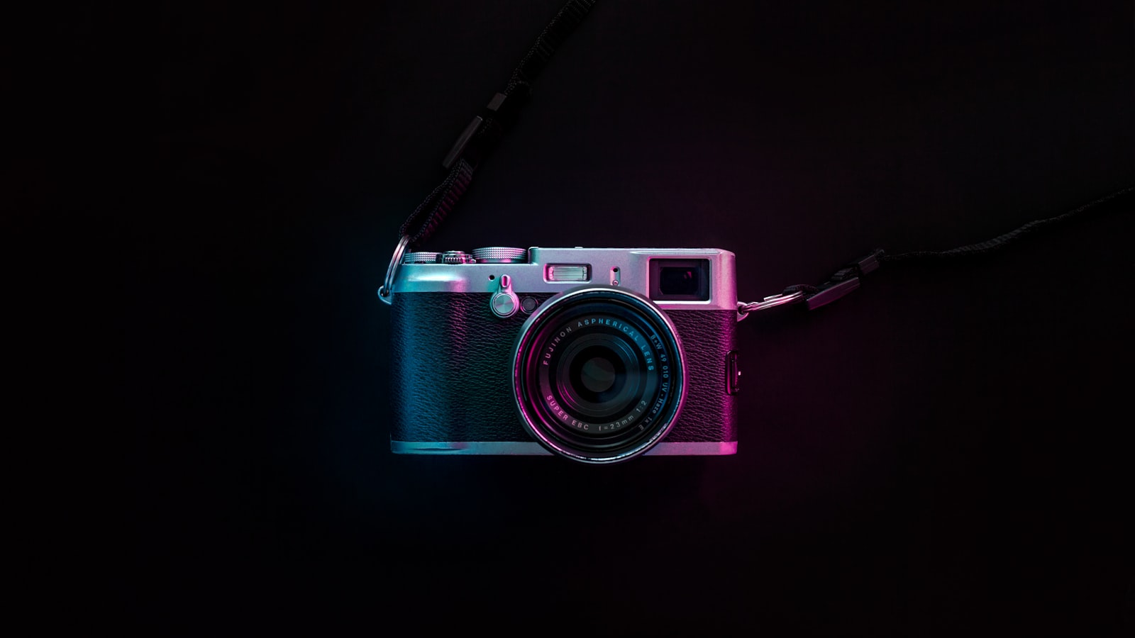 Soft glowing circles of blurred light behind a single point of focus.